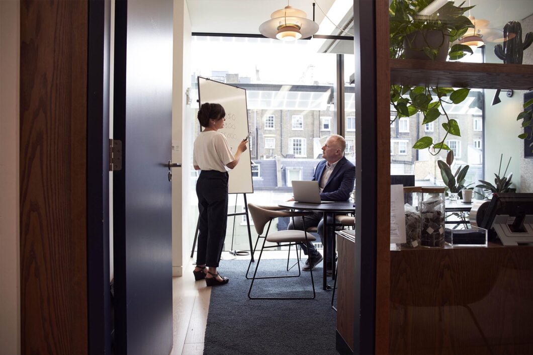 Outraged Employee Breaking Pencil At Workplace. Angry Businesswoman Suffer From Nervous Breakdown